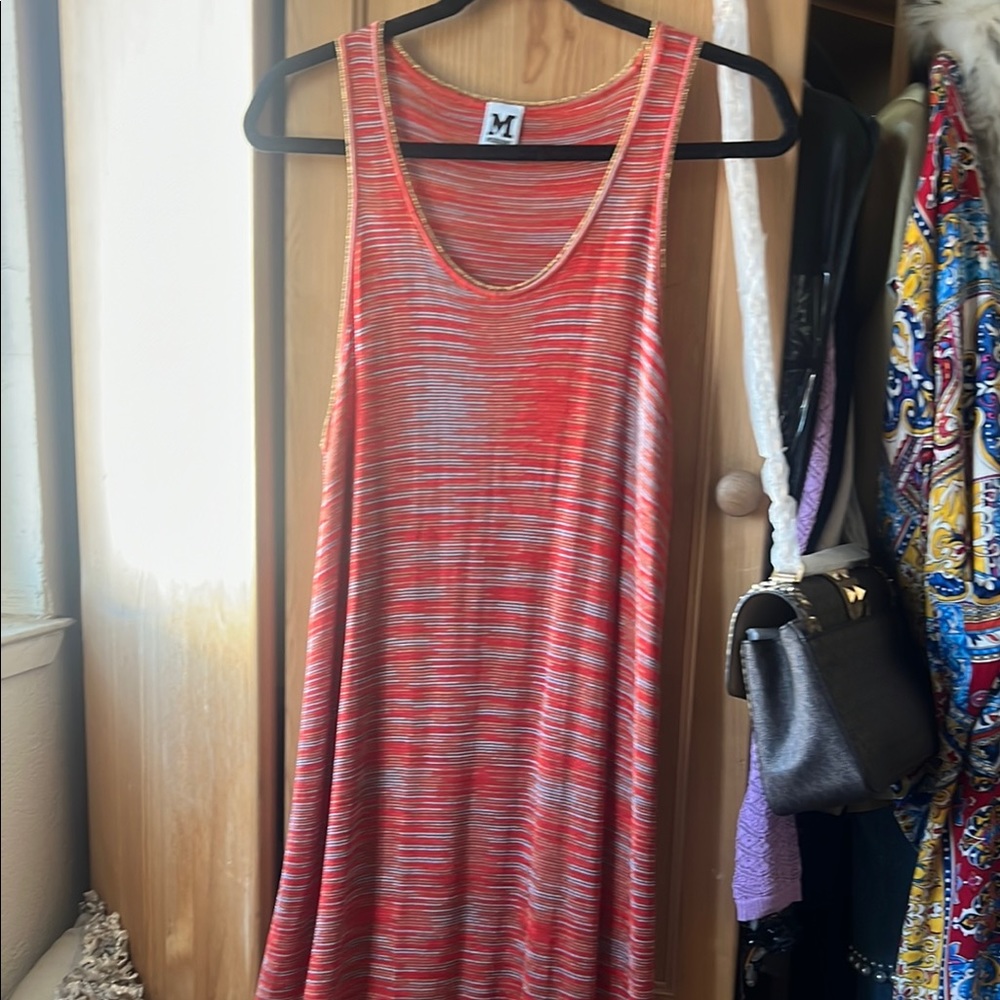 Beautiful Missoni Maxi dress with gold bottom and edges. Like new condition